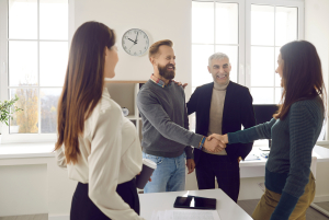 A group of professionals engaged in a friendly meeting